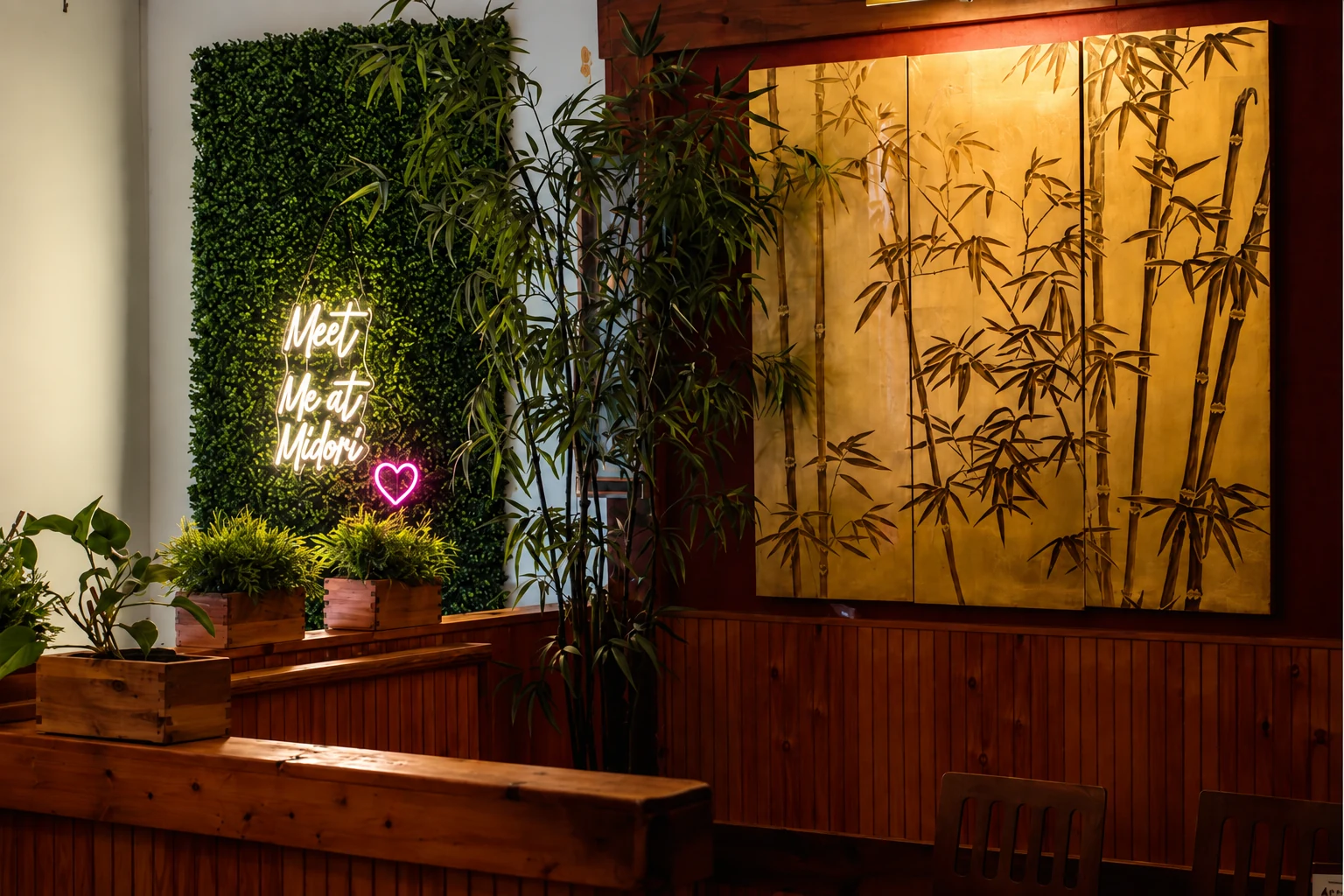Wood booths, bamboo and the Meet Me at Midori sign